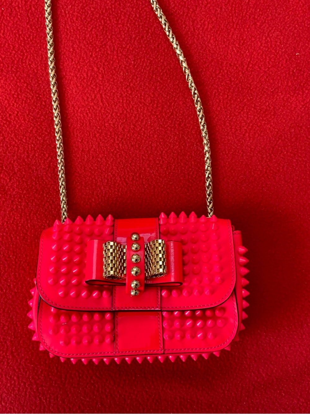 Christian Louboutin Hot Pink Leather Spiked Sweet Charity Bow Crossbody Bag